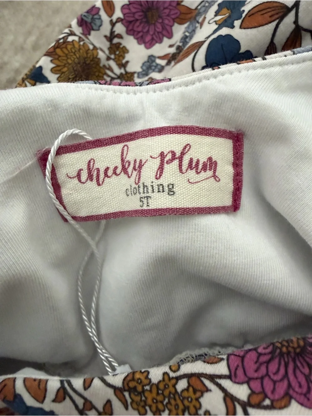 cheeky plum Floral Print Long Sleeve One-Piece in Cream, Purple, Blue, Brown